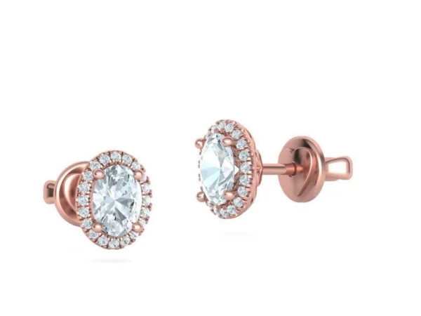 Pair of exquisite oval diamond stud earrings on a simple, elegant backdrop, emphasizing the refined and modern design of the diamond settings, ideal for both formal and casual wear.