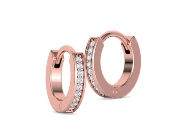 Elegant small flat diamond hoop earrings with sparkling stones set in a sleek, contemporary design, reflecting light beautifully against a plush velvet background.