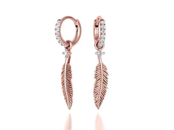 A pair of Feather Small Hoop Earrings with a soft, rose gold finish, each hoop adorned with a lifelike feather detail, combining contemporary style with a touch of nature-inspired beauty.