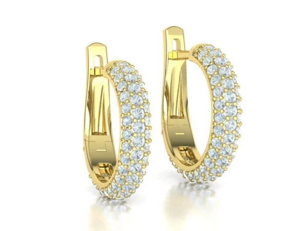 A pair of sophisticated hoop diamond earrings with a silver finish, gracefully hanging from a velvet jewelry stand, highlighting their brilliance and timeless design.
