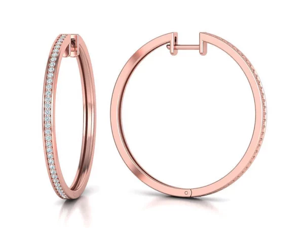 A pair of elegant silver hoop earrings with a shiny finish, displayed against a white background, highlighting their simple yet sophisticated circular design.