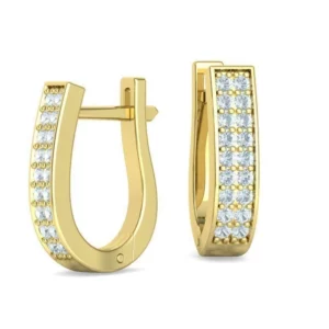 Elegant Huggie Diamond Earrings with sparkling stones set in a snug, circular design, shining brightly against a plush, velvet background.