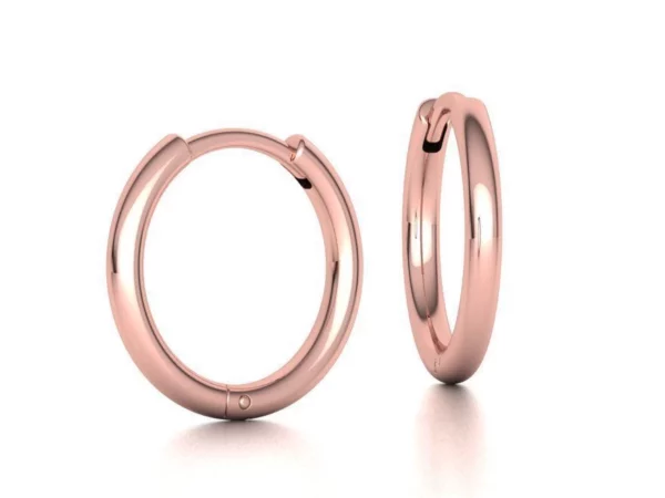 A pair of shiny gold Round Hoop Earrings displayed against a white background, showcasing their simple yet elegant circular design.