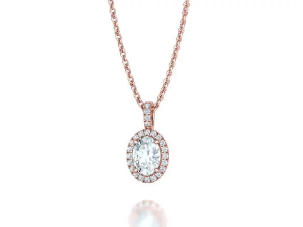 Close-up of a Small Diamond Oval Pendant with a dazzling diamond at its center, attached to a delicate chain, radiating sophistication.