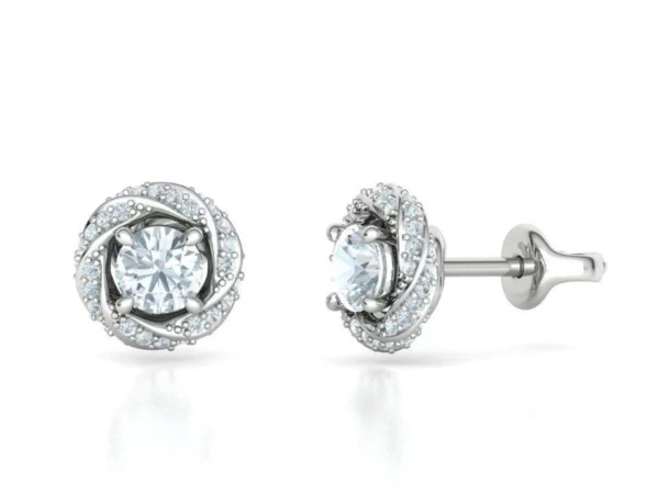 Close-up of bespoke stud earrings with radiant half-carat stones, intricately set in a fine metal choice, emphasizing the earrings' luxurious and personalized design against a gentle, muted backdrop.